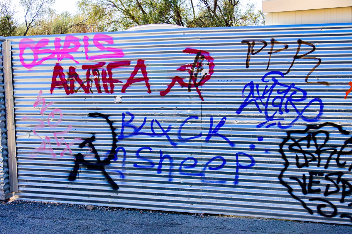 Graffiti Covered Metal Fence Corrugated